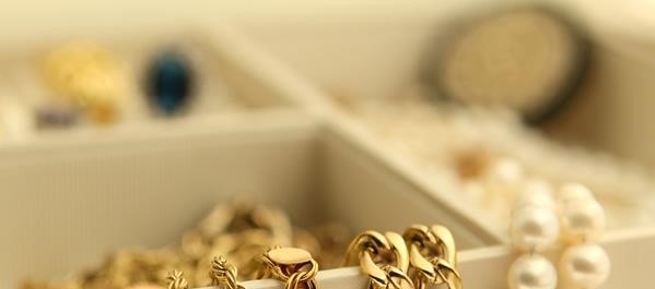Jewellery arranged in a compartmented box